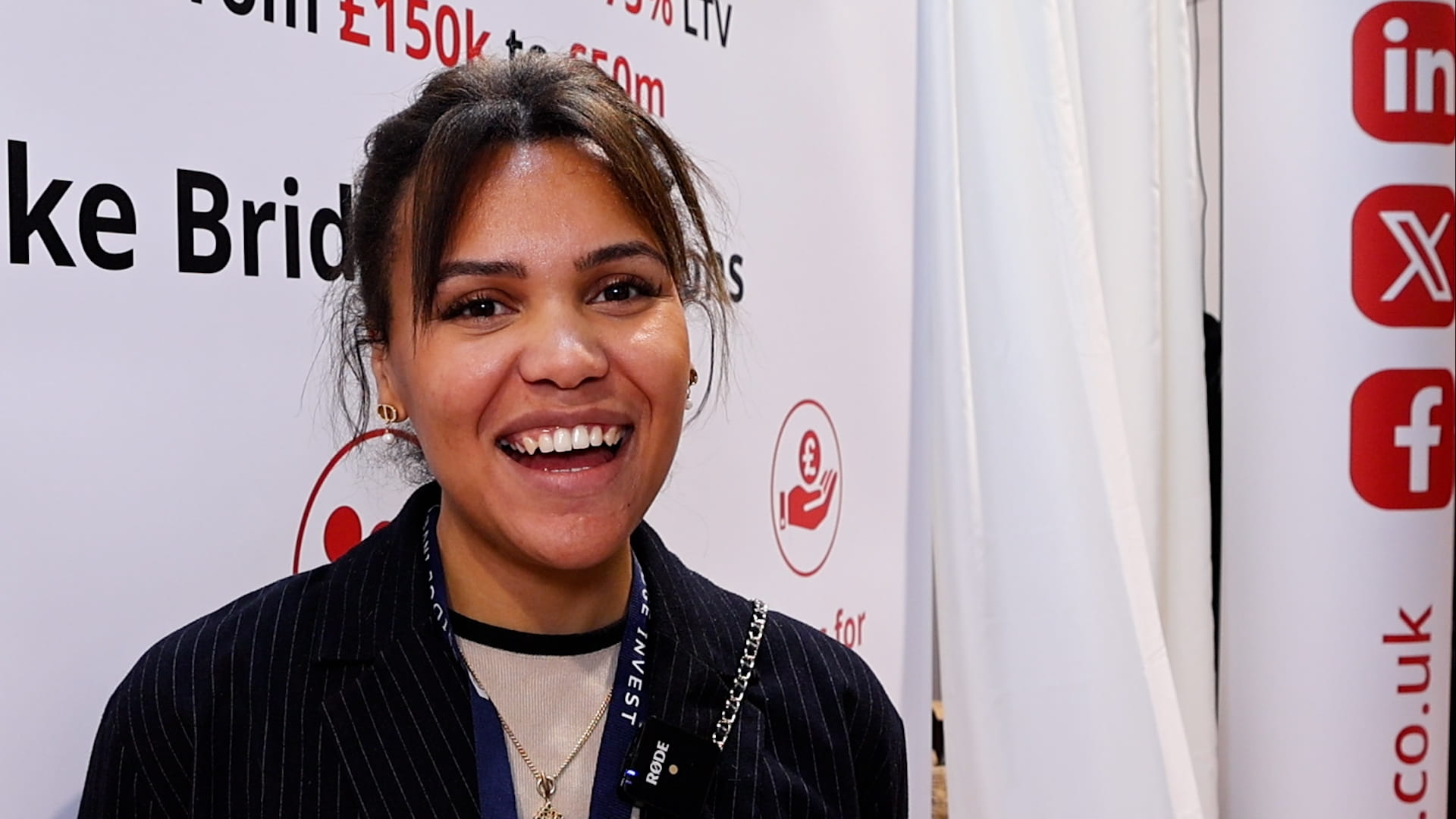 Bethan Jones of KSEYE at The Finance Professional Show 2025 with a Quadrant2Design Exhibition stand