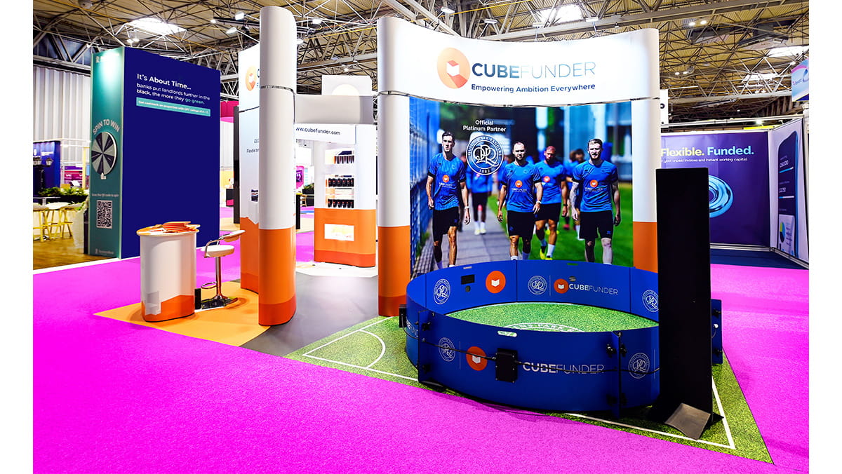 Bright, open island exhibition stand for exhibitor CubeFunder at NACFB Commercial Finance Expo by Quadrant2Design.